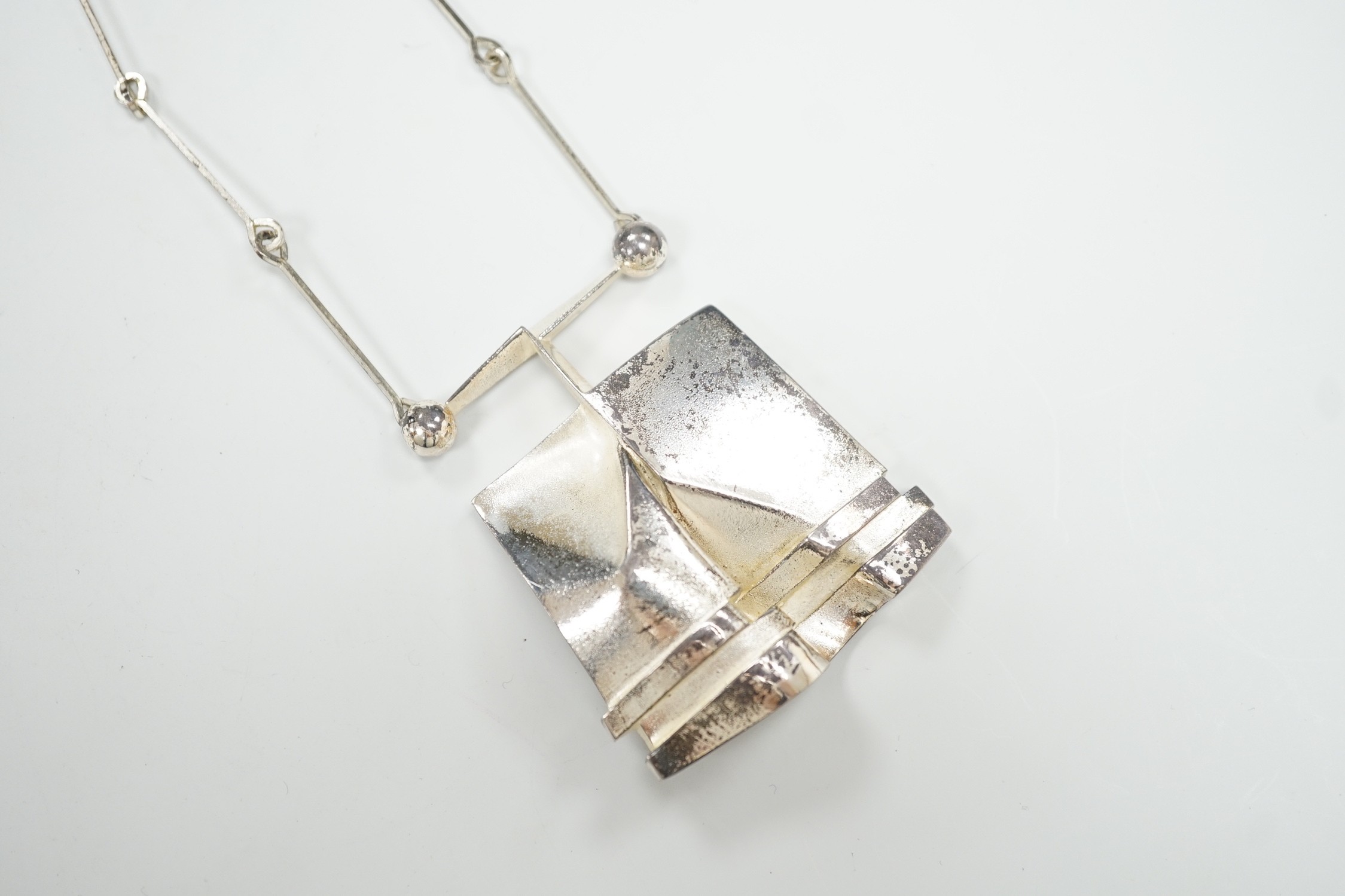 A modern Finnish sterling abstract pendant necklace, 84cm, 52 grams.